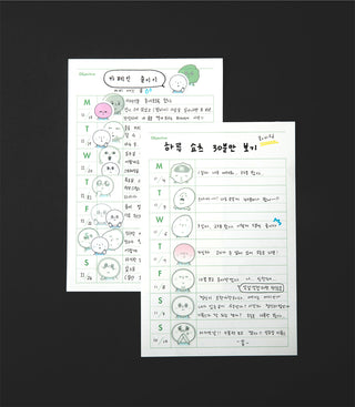 Two sheets of a planner with Korean text and cartoon character stickers on a black background