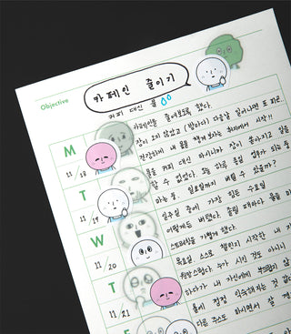 Sheet with a planner layout featuring cartoon character stickers and text on a black background