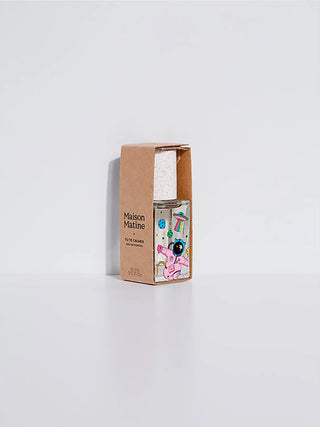 Perfume packaging with 'Maison Matine' branding on a light gray background