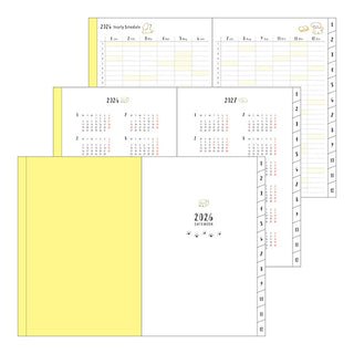 Planner with yellow pages and monthly schedule layout
