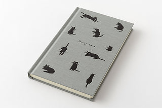 Gray notebook with black cat illustrations on a white background