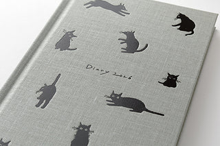 Gray diary with black cat illustrations