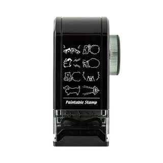 Black paintable rotary dial stamp showing speech bubbles and animal line icons