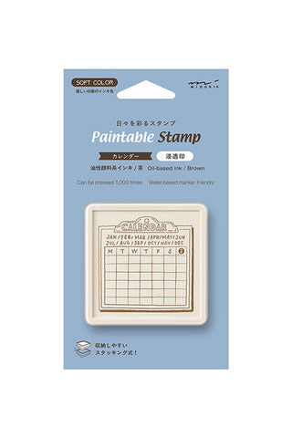 Paintable Stamp Calendar ink stamp in a brown color, in light blue packaging with Japanese text