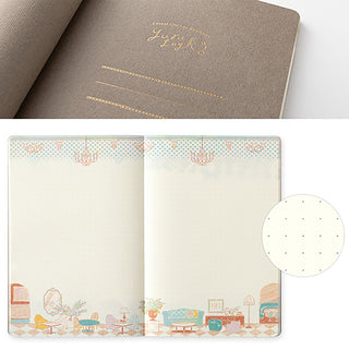 Notebook with decorative cover and interior pages on a white background
