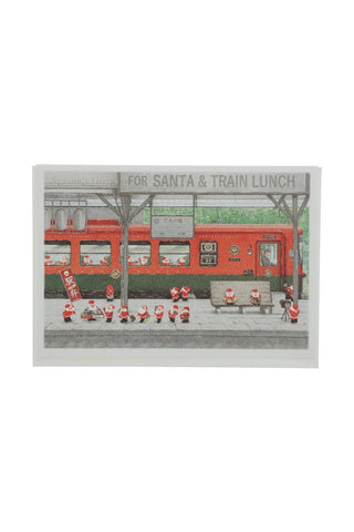 Illustration of a train with Santas at a station eating lunch, labeled 'For Santa & Train Lunch'.