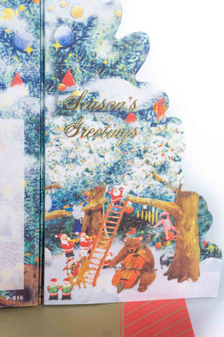 Christmas-themed greeting card with a snowy scene, trees, santas and animals playing instruments.