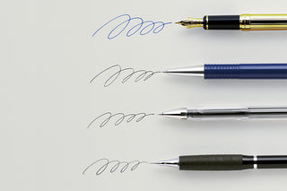 Four pens aligned vertically on a light gray background, each writing a squiggle to show how different pens write on specific paper