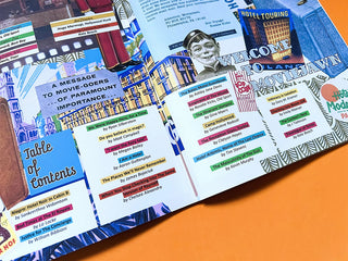 Close-up of opened Movie Jawn 2026 magazine on an orange background