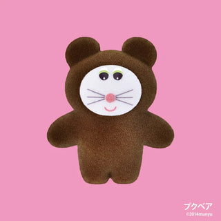 Brown teddy bear plush toy with a white face on a pink background