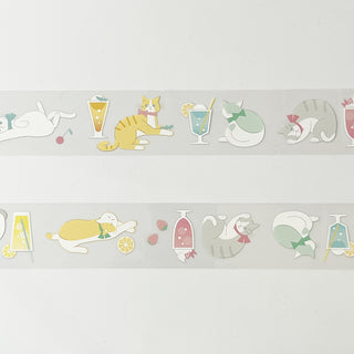 Decorative washi tape with cartoon cats and drinks on a light gray background