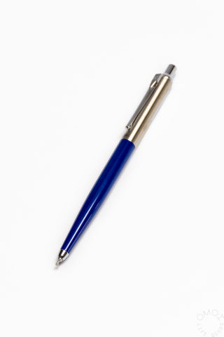 Blue pen with silver accents on a white background