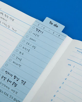 Close up of to do memo bookmark in planner