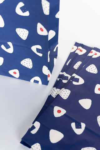 Navy blue bag with onigiri pattern on a white background