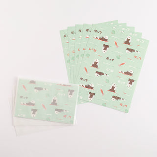 Green letter set with otter illustrations on a white background
