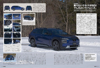 Blue SUV in a snowy landscape with text and images on a magazine page.