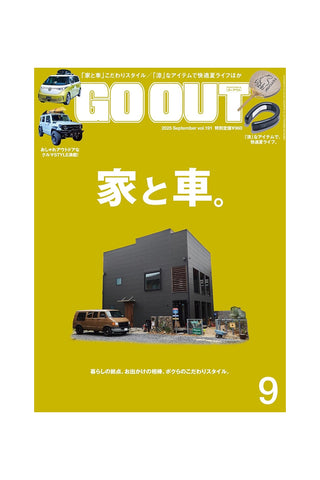 Magazine cover with a yellow background featuring cars and a building.