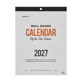 A wall board calendar hanging for 2027, featuring a light gray background with black and orange text. 