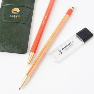 Two pens and a pencil sharpener on a white background with 'Beams Japan' branding.