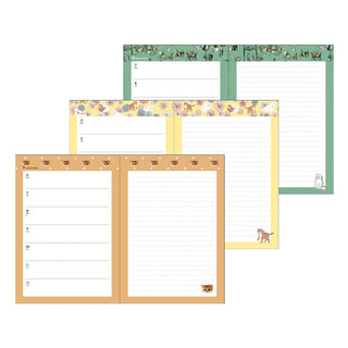 Paul & Joe planner weekly spreads in green, yellow, and tan animal-themed designs