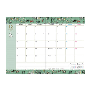 Paul & Joe planner monthly calendar page with green animal-print borders