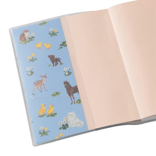 Paul & Joe planner inside cover with blue animal illustrations and pale pink lining