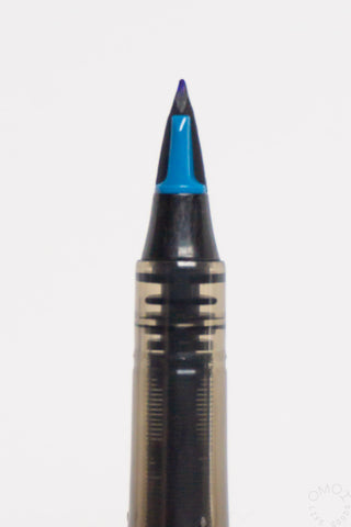 Marker pen with blue tip on a white background