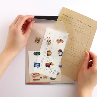 Person inserting paper into file folder
