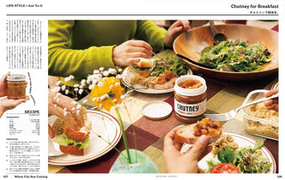 People enjoying a meal with Chutney on a table, surrounded by food in a magazine format