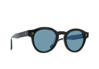 RAEN round sunglasses, dark frame with blue lenses and small gold speck accents