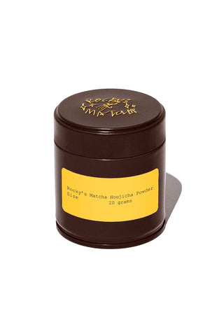 Brown container with yellow label and rocky's matcha branding on a white background