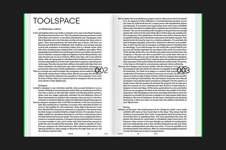 Open magazine with text on a black background