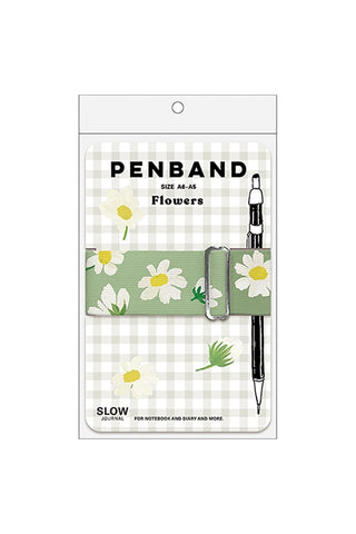Penband with floral design and pen on a checkered background