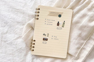 Shopping list sticker sheet with checklist lines and small camera, perfume, and bag icons