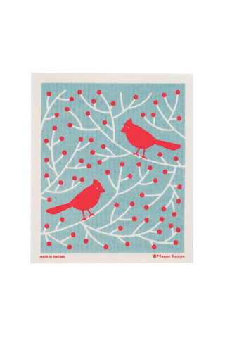 Swedish dishcloth with print of red cardinals and berries design on a blue background