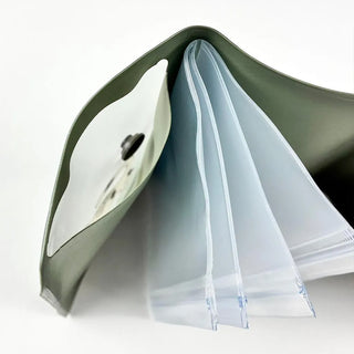 Close-up of upside down fanned out Green cat design 5 pocket pouch on a white background