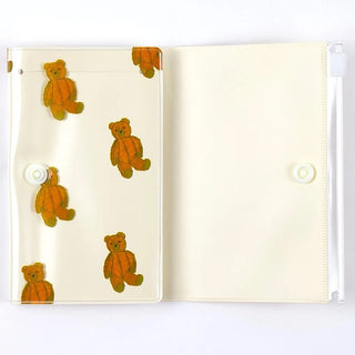 Halfway opened brown bear pattern 5 pocket pouch on a white background