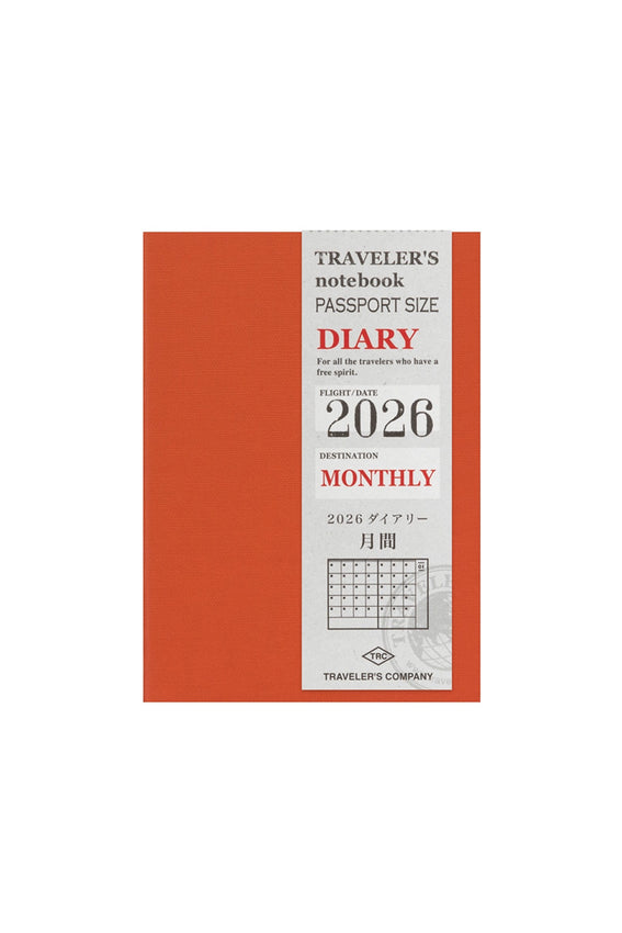 Traveler's notebook monthly planner cover with orange border and white text on a white background