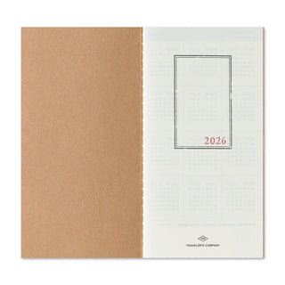 Inside of the Traveler's Monthly plannner with '2026' text, on a white background.