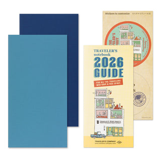 Traveler's notebook 2026 Guide with blue cover and additional stickers on a white background