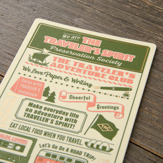 Vintage-style pencil board for 'The Traveler's Spirit Preservation Society' on a wooden surface