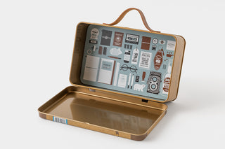 Bronze mini brief case with a textured interior on a white background