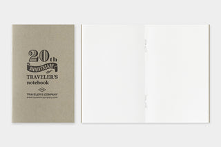 Traveler's Company notebook with '20th Anniversary' text on a white background