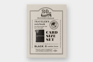 Packaging of a card size set for a traveler's notebook with branding on a white background