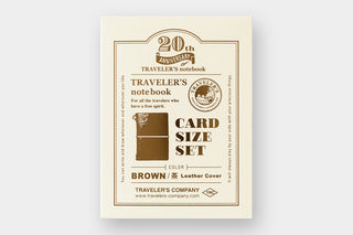 Card size set packaging for a traveler's notebook with branding on a white background