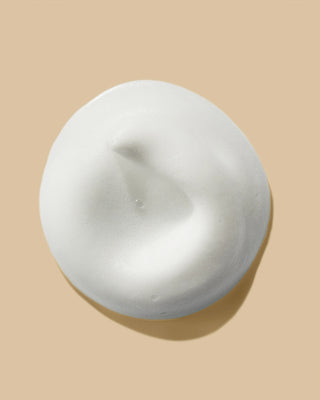 Round white cleanser foam texture