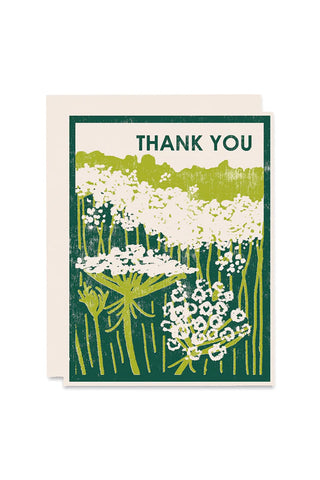 Greeting card with floral design and 'Thank You' text on a white background