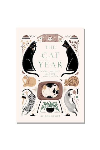Cover of The Cat Year Book with various cats doing activities on the cover