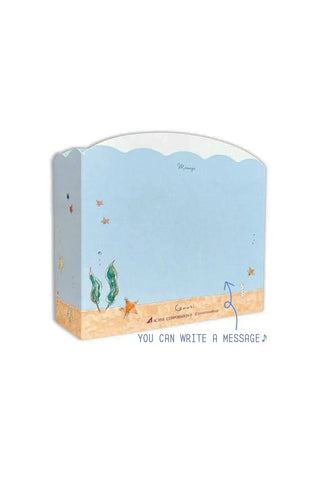 Card with a beach scene design on a white background