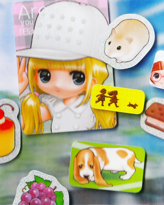 Collection of cartoon-style figurines and stickers with a girl, dog, and other elements on a colorful background.